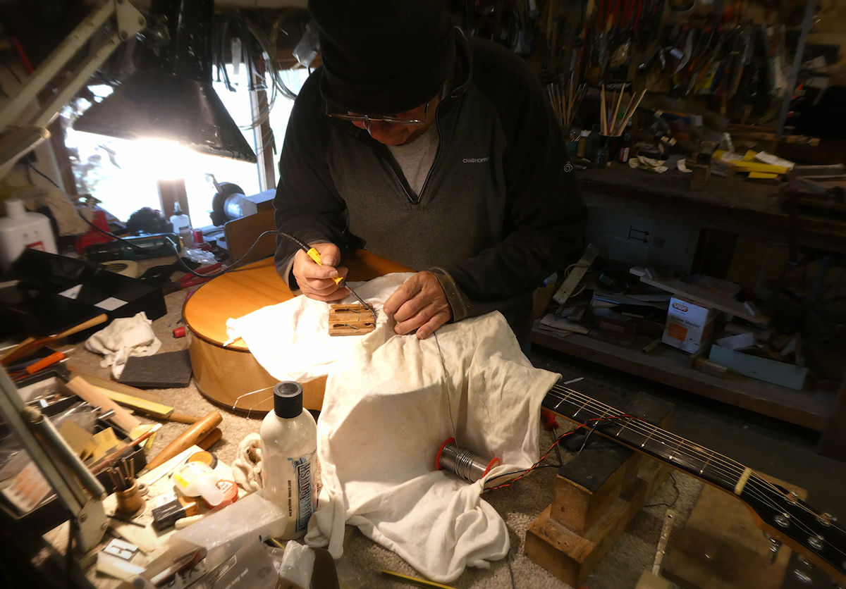 Andy fitting Fishman on Brook Okement